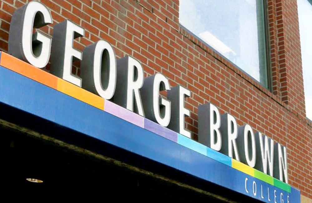 Exterior sign of George Brown College, highlighting student participation in a live eProcurement platform for a simulated bid tendering competition.